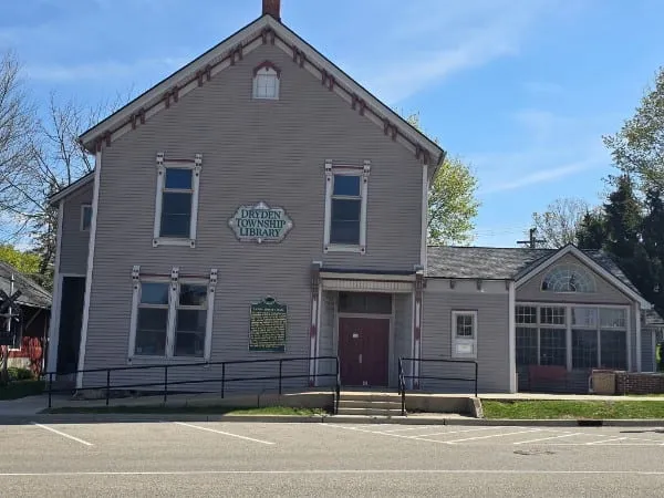 Dryden Township Library, an 1800s-era wood building in downtown Dryden